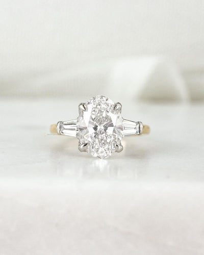 Oval Trilogy with Baguette Side Stones