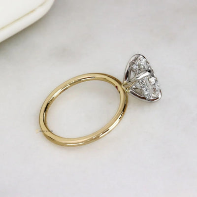 Two-Toned Engagement Ring with Oval and Hidden Halo