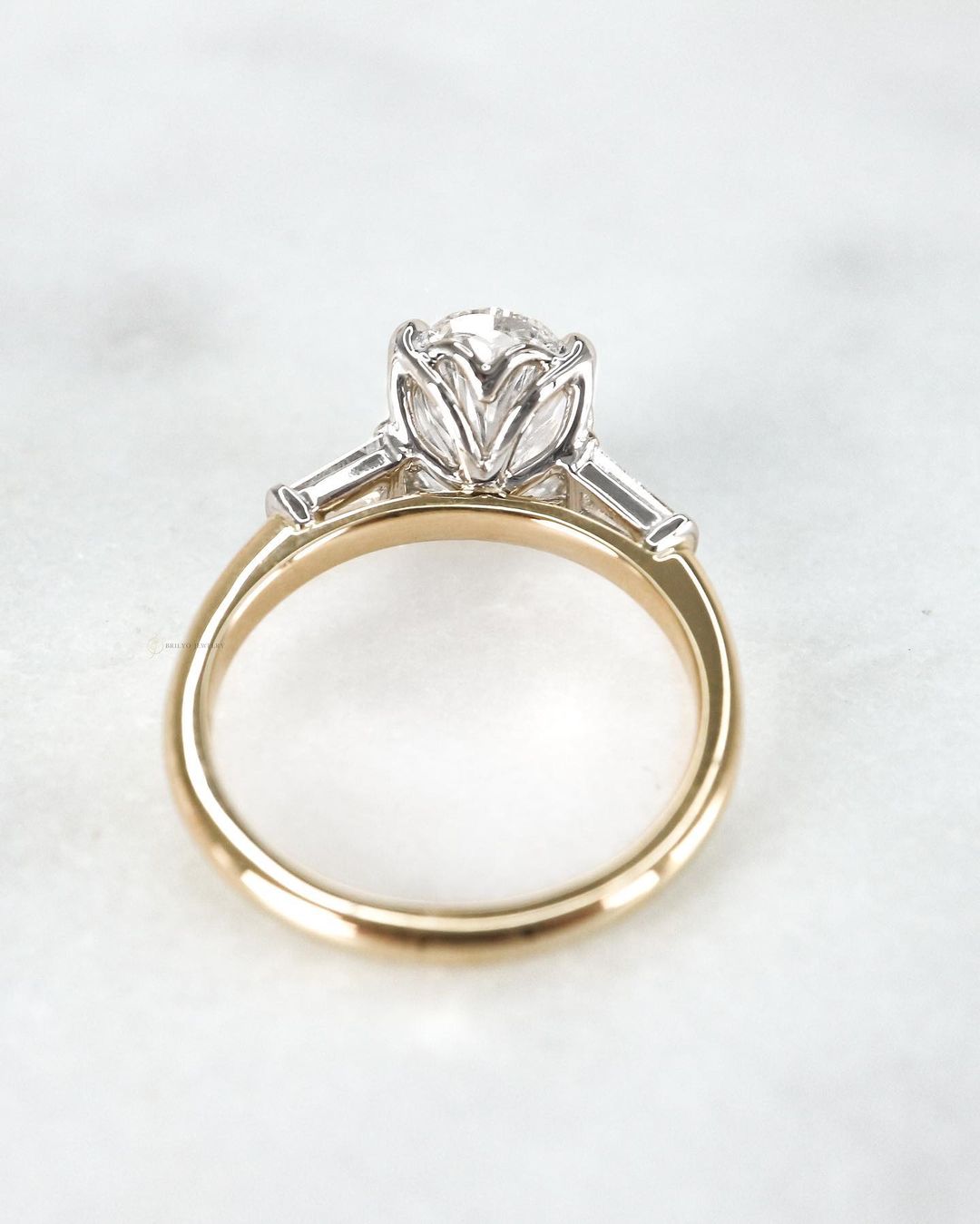 Oval Trilogy with Baguette Side Stones