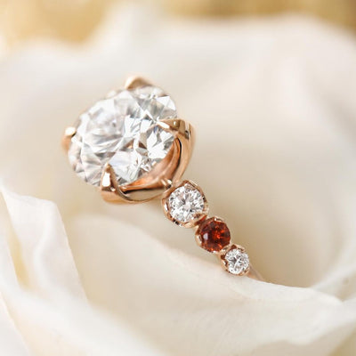 Rose Gold Diamond Ring with Garnet Side Stones