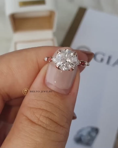 Rose Gold Diamond Ring with Garnet Side Stones