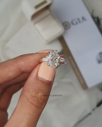Oval Trilogy with Baguette Side Stones